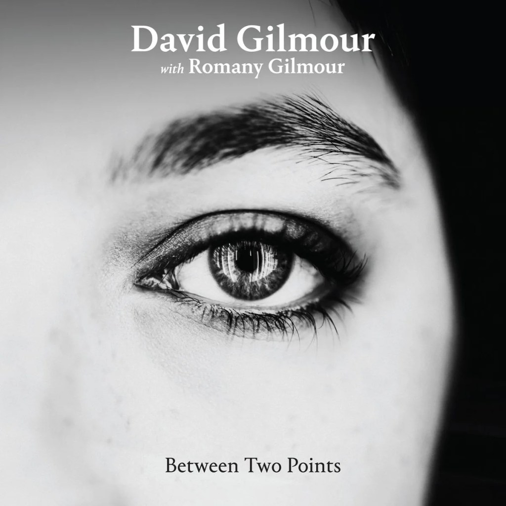 David Gilmour ve kızı Romany Gilmour'un _Between Two Points_ adlı şarkısının kapak tasarımı; odak noktası olarak bir göz görüntüsü ve başlık ile birlikte.